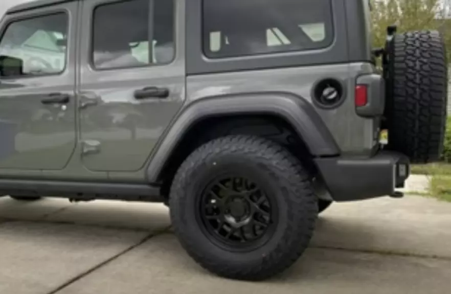 33” Tires on a stock Jeep wrangler with no lift for our review on Best tires for jeep wrangler daily driver