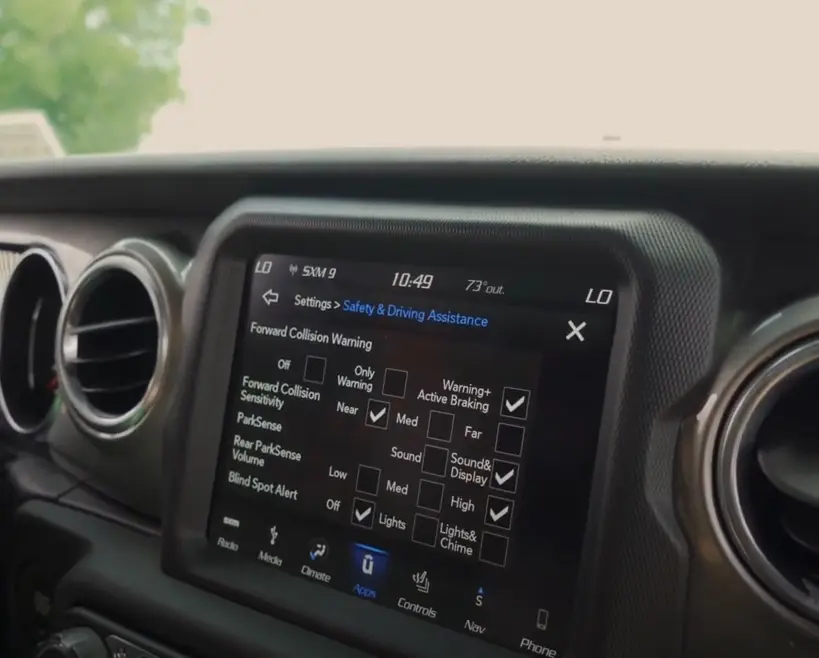 Forward Collision Warning Setting features on a Jeep Uconnect Touchscreen