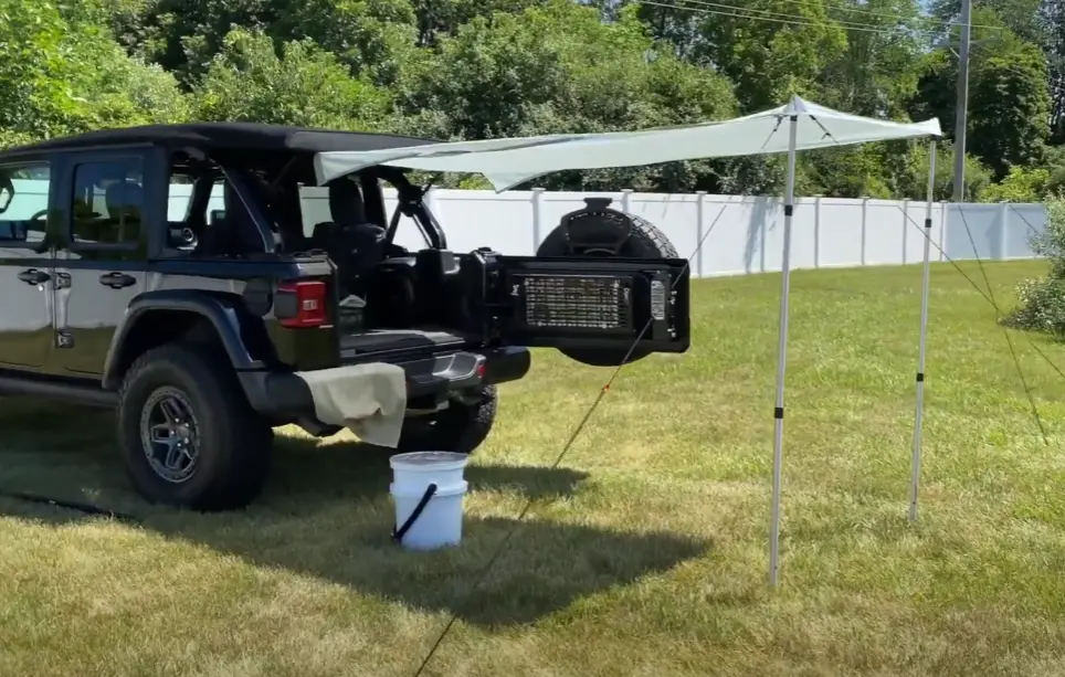 Jeep awning attached on the rear of a Jeep Wrangler