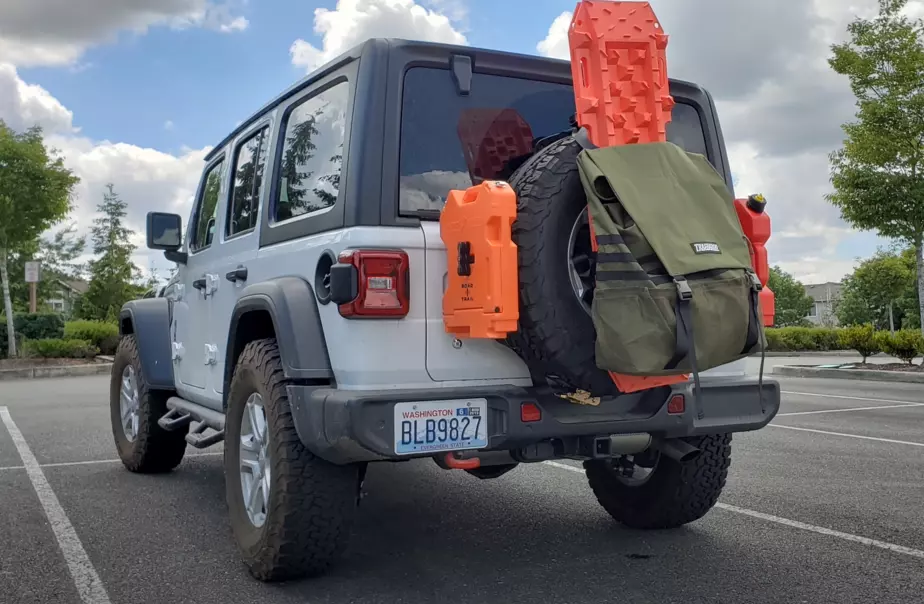 Jeep gas can mounted on a Jeep tailgate