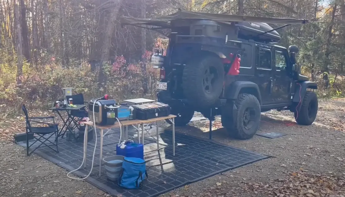 Camping in a Jeep Wrangler with all gears and accessories set-up