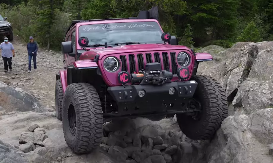 big jeep tires on an off-roading Jeep Wrangler