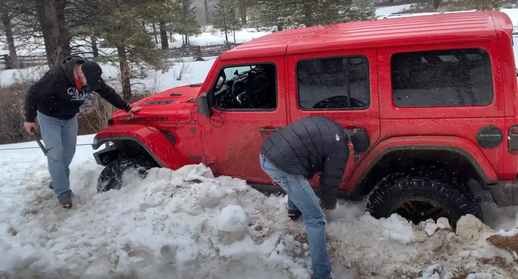 Jeep runner team (James and Mark) testing a Jeep Wrangler Rubicon Tires, Rims, ground Clearance, Winch, and Offroad Fuel economy on a long day Jeep Field test in winter badge of honor trails.