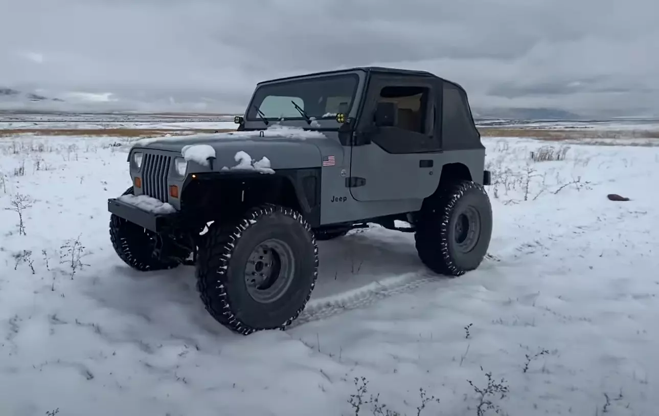 Testing the Best Snow Tires for Jeep Wrangler on a snow field