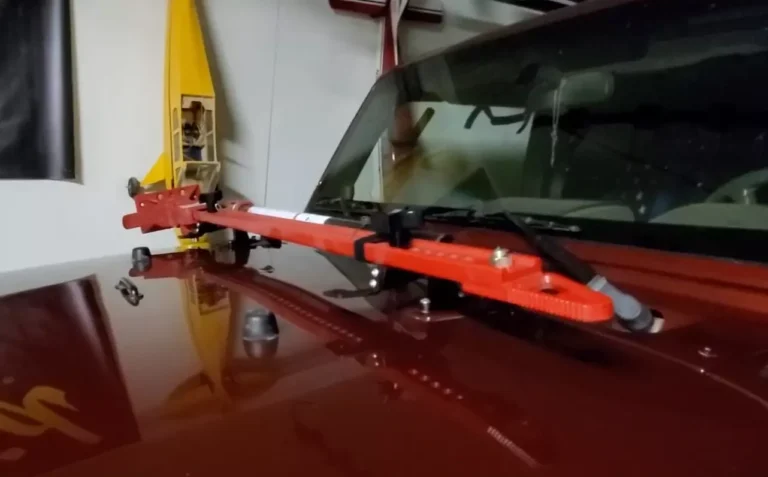 Hi-Lift Jack HM-900 hi-lift Jack mounted on a Jeep hood