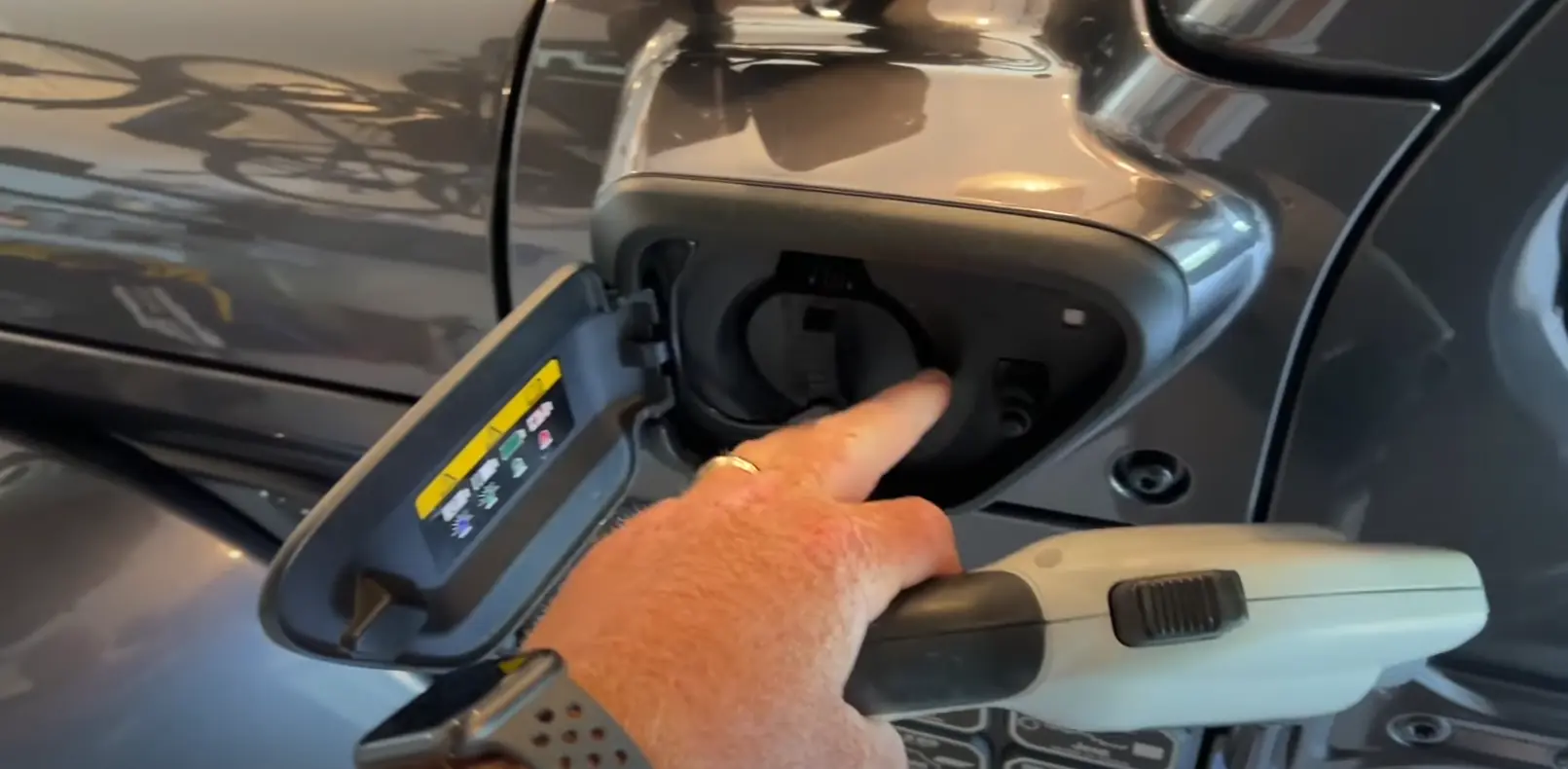 Close-up of Jeep 4xe charging port and charger connection that you need to check when your Jeep 4xe is not charging