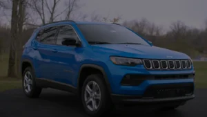 A compact Jeep Compass SUV with a stylish blue exterior