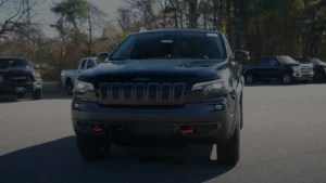 A versatile Jeep Cherokee with a bold front grille and athletic stance